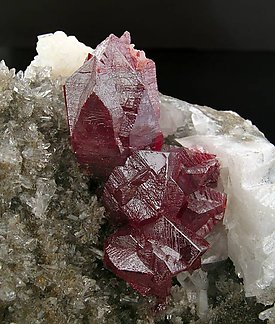 Cinnabar (twinned) with Quartz and Dolomite. 