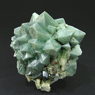 Powellita con inclusiones de Celadonita. 