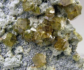 Andradite (variety topazolite). 