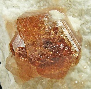 Grossular (hessonite) with Albite. 