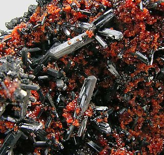 Gaudefroyite with Andradite and Baryte. 