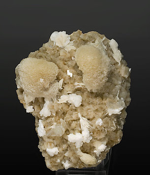 Mesolite with Heulandite-Ca and Laumontite. 