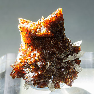 Helvine-Genthelvite with Quartz. Light behind